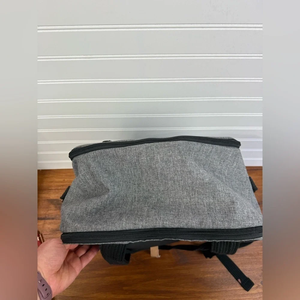 Petunia Pickle Bottom gray & black backpack shoulder diaper bag.